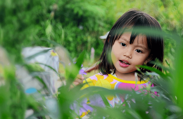header-get-involved girl in grassy field